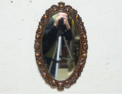 Овальное металлическое зеркало 