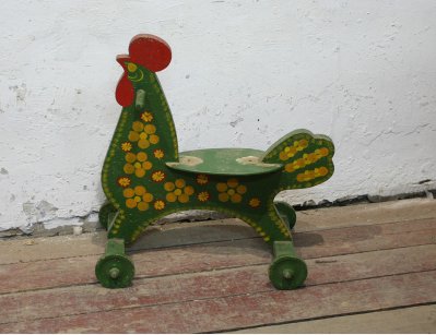 Детская игрушка Петушок на колесах